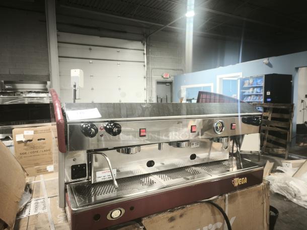 Wega Atlas EVD 2-Group Commercial Espresso Machine, stainless steel finish, used condition, includes control knobs and drip tray.