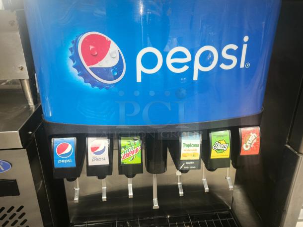 Lancer heavy-duty Pepsi 6-flavor soda fountain dispenser with ice bin, featuring Pepsi branding and multiple soda options.