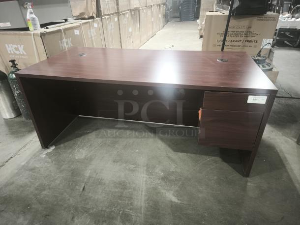 10500 Series Left Return Pedestal Desk, wood finish, built-in cable grommets, condition appears used, label number 151.