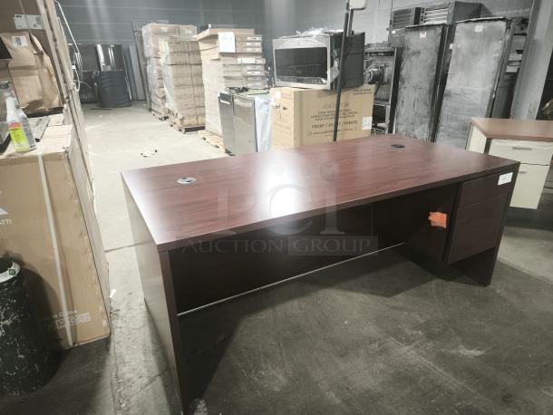 10500 Series Left Return Pedestal Desk, mahogany finish, features grommet holes, two drawers, excellent condition.