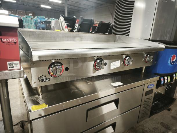 LIKE NEW Star-Max 648MF 48" gas griddle, manual controls, 113,200 BTU, stainless steel, excellent condition.