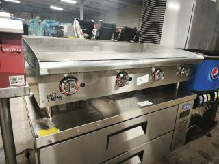 LIKE NEW Star-Max 648MF 48" gas griddle, manual controls, 113,200 BTU, stainless steel, excellent condition.