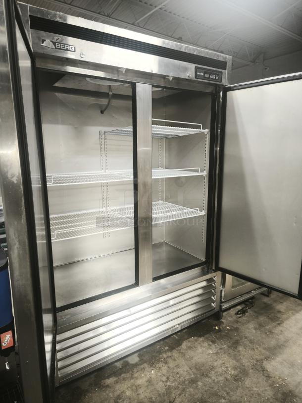 Brand new BERG BRG-F49 solid-door commercial freezer with dual doors, stainless steel finish, and adjustable shelves.