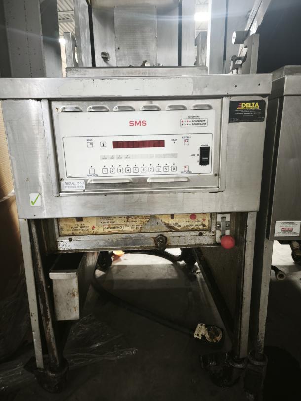 SMS Computron 8000 pressure fryer, stainless steel, working condition before removal, visible control panel and model label.