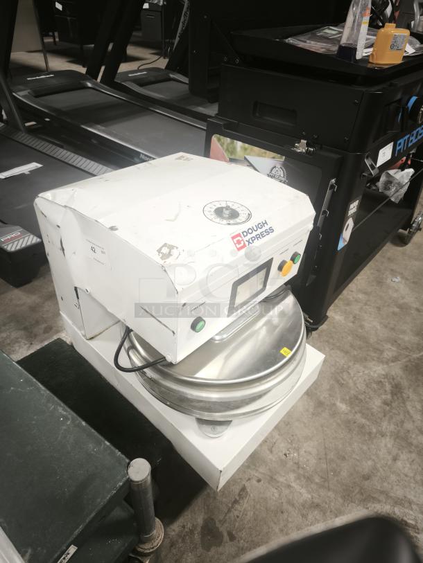 Dough Xpress DXE-WH 18" electromechanical pizza dough press, nearly new, features automatic operation, 120V, 1150W.