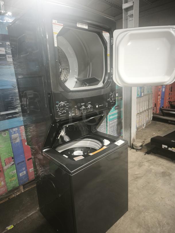GE Unitized Spacemaker washer and dryer, model GUD27ESPM1DG, new condition, 3.8 cu ft washer, 5.9 cu ft dryer, stainless steel basket.