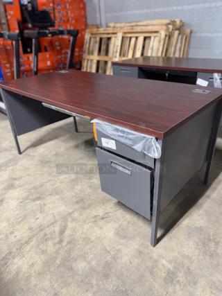 ALERA double pedestal steel desk, model ALEHSD6030CM, 60"x30"x29.5", mahogany top, charcoal legs, new with dents and scratches.
