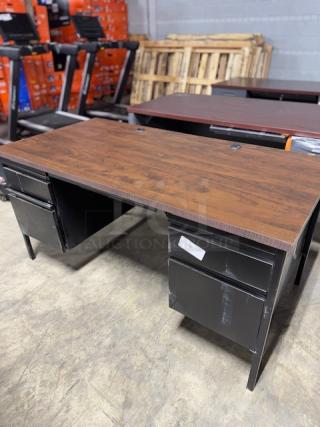 Alera ALEHSD6030BM desk, featuring a wood grain tabletop and black metal drawers. Visible tag with model details.