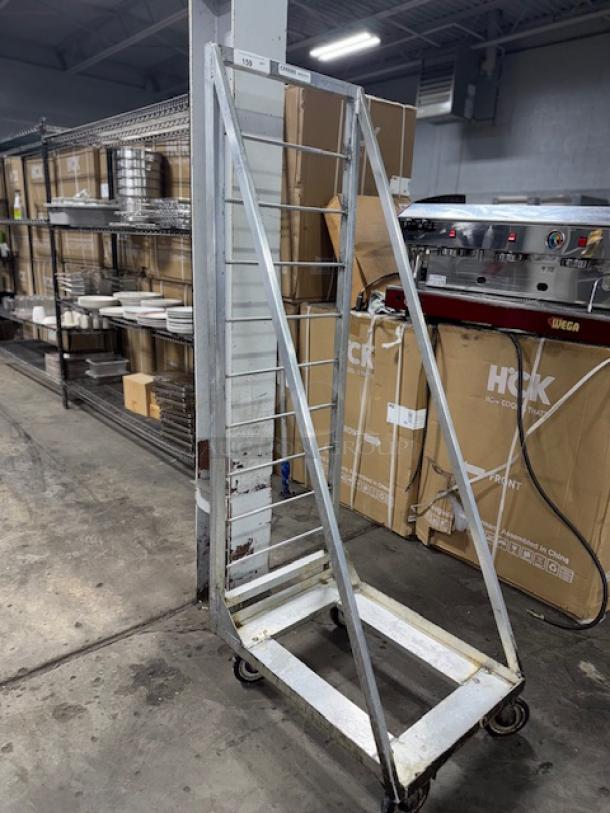 Channel FBR-27 mobile fryer basket rack with 27 basket capacity, metal frame, visible wear, on casters for mobility.