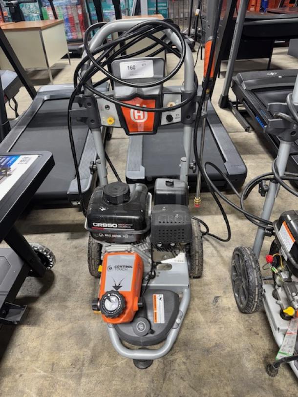 Husqvarna PW-3200 gas pressure washer, model 022007, features 3200 PSI, tested and working, GE CR950 engine, orange accents.