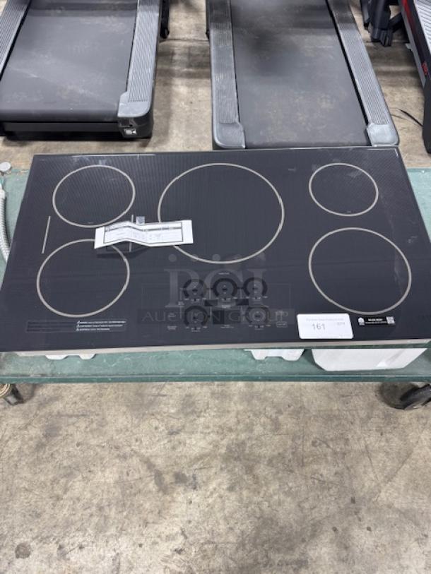 Brand new Café 36" built-in electric induction cooktop, model CHP90361TBB, black finish, touch controls, five burners, ENERGY STAR certified.