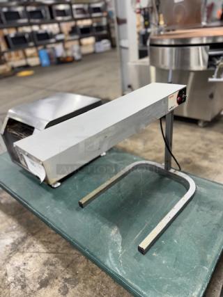 Nemco 6152-24 single rod strip warmer with fixed arm, built-in toggle switch, tested working. Visible wear, 120v.