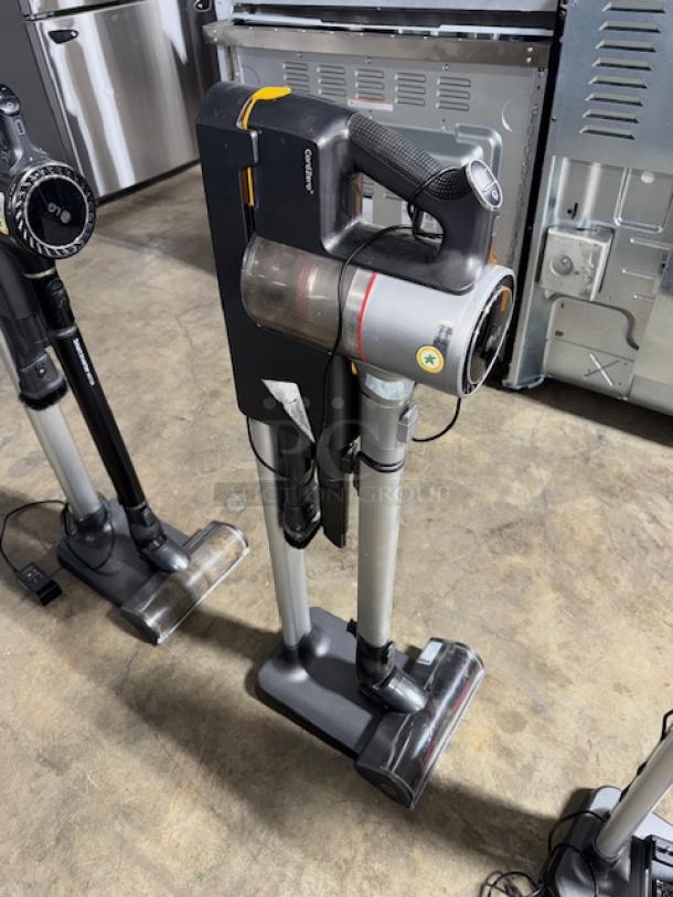 LG CordZero A9 cordless stick vacuum, tested and working, features sleek design, docking station, in good condition.