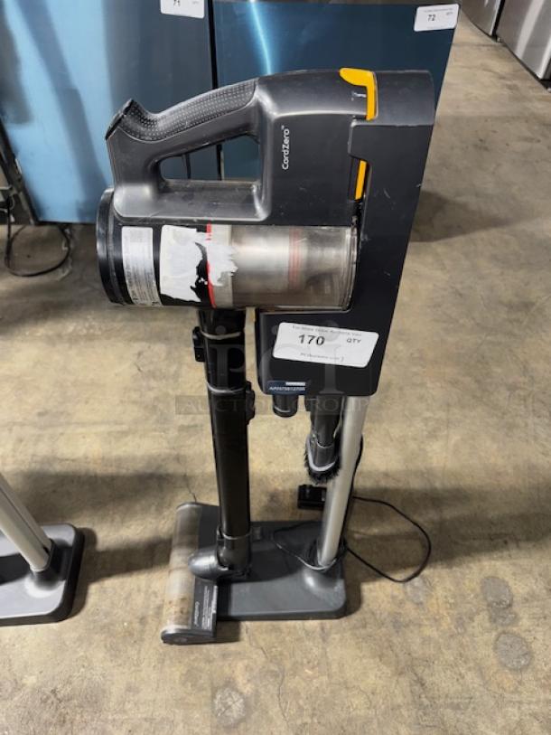 LG CordZero A9 cordless stick vacuum, tested and working condition, visible dustbin and handle, auction lot tag attached.