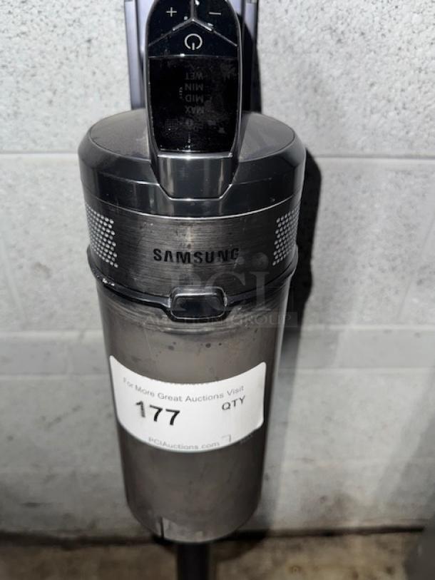 SAMSUNG cordless vacuum cleaner, tested and working, sleek design, visible controls, with auction label reading "177 QTY".