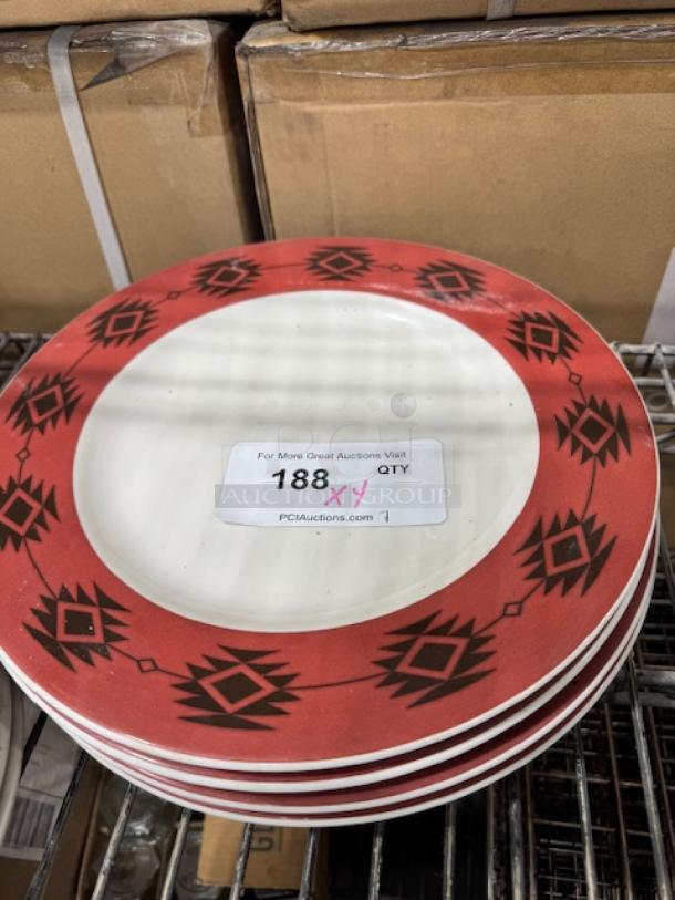 CERAMIC wide rim stoneware plate with rolled edge, red and black geometric pattern. Auction label shows "188 X4".