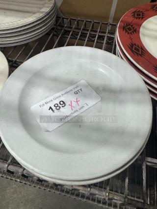 CERAMIC wide rim rolled edge stoneware plate, white, good condition, visible auction label with lot number 189.