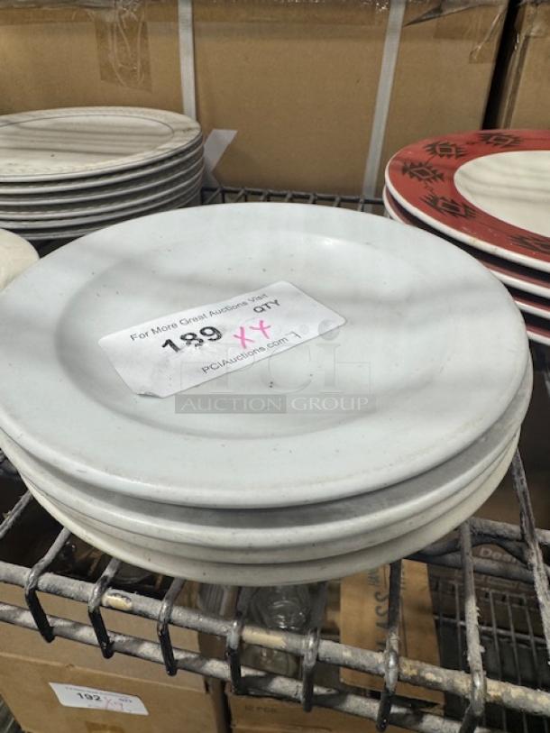 CERAMIC wide rim rolled edge stoneware plate stack, neutral tone, sturdy condition, auction tag number 199 visible.