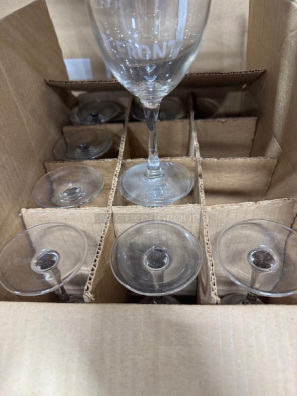 8 oz. customizable wine glasses in a box, new condition, featuring engraved text. Ideal for personal or event use.