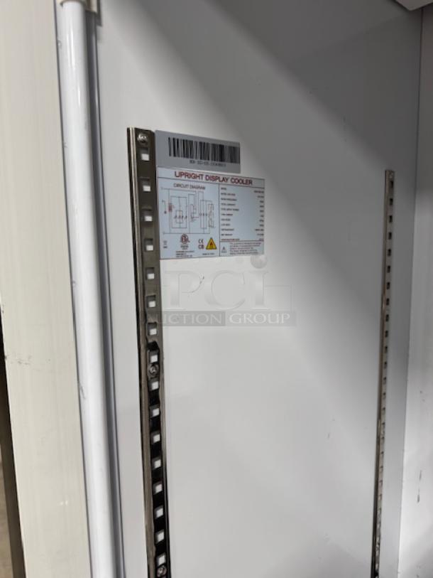 Avantco GDC-69-HC merchandiser refrigerator interior, missing doors, model 178gdc69hcb, features LED lighting.