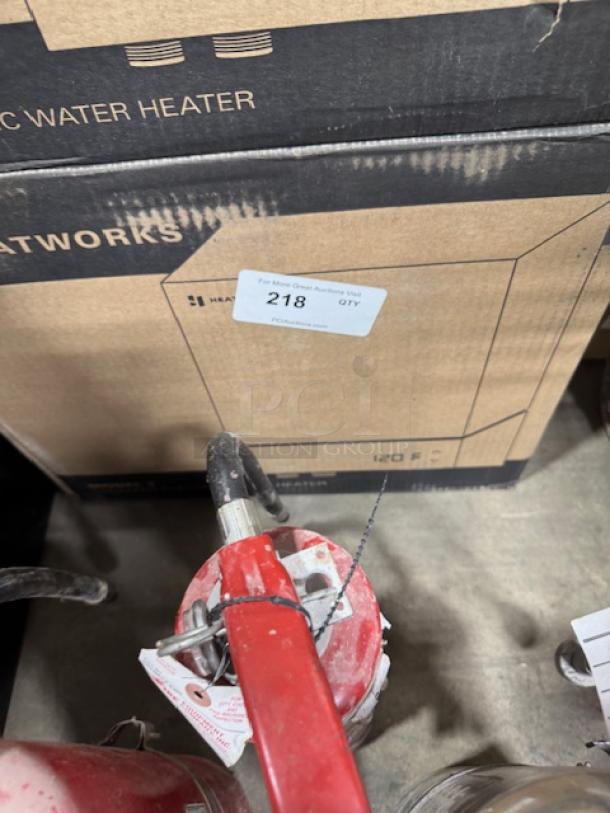 BRAND NEW Heatworks MODEL 3 Electric Tankless Smart Water Heater, boxed, model HW-0007, auction label "218 QTY" visible.