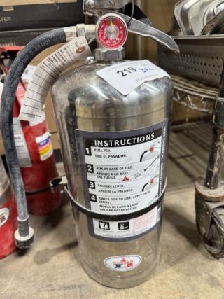 Class ABC fire extinguisher set, stainless steel, includes three pieces. Visible instructions and condition appear used but well-maintained.
