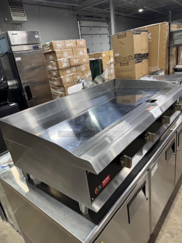 Brand new Cooking Performance Group GTU-CPG-48-L Ultra Series 48" chrome-plated gas griddle, 4 burners, 120,000 BTU.