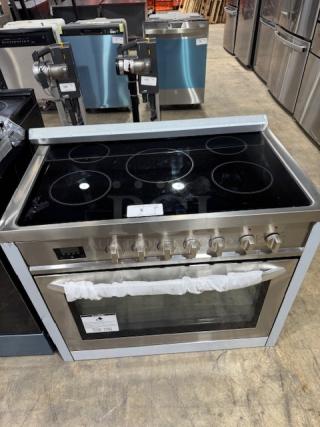 Brand new KoolMore KM-FR36EE-SS 36-inch electric range, stainless steel, six-burner cooktop, oven with glass door.