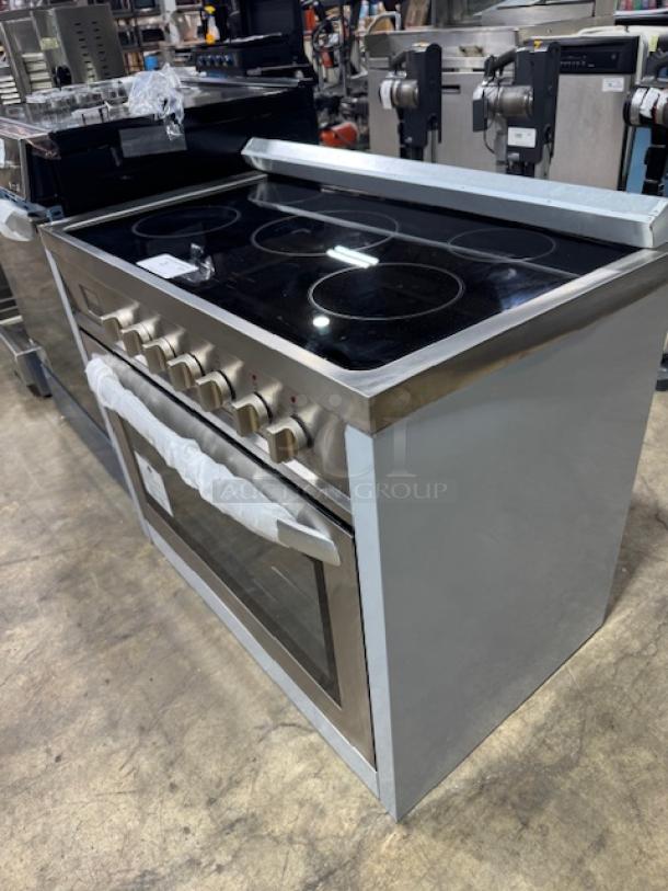 Brand new KoolMore 36-inch all-electric range, model KM-FR36EE-SS. Stainless steel finish, professional-grade knobs, oven, and glass cooktop.