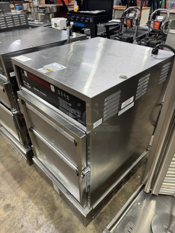 Henny Penny AHC-993 humidified heated pass-thru holding cabinet, stainless steel, 120V, in tested working condition.
