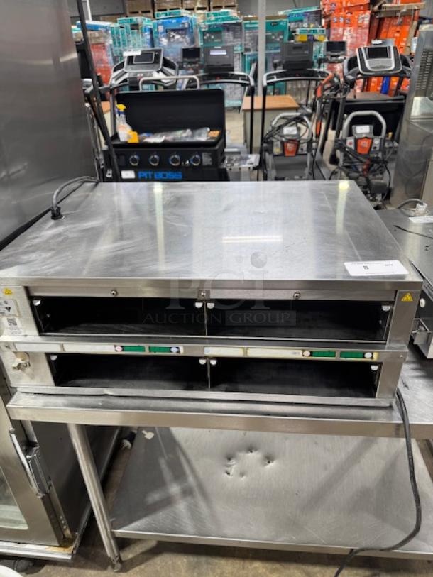 Prince Castle DHB2PT-33KFCB freestanding warming unit, 33"W, two 24" compartments, very clean, tested and working.