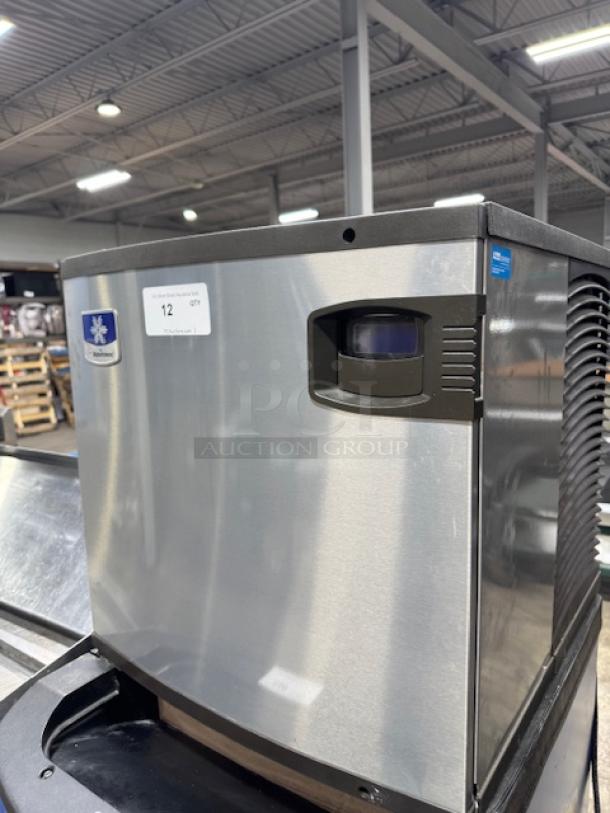 Manitowoc IYT0620A-161 Indigo NXT 22" air-cooled ice machine, like new, 575 lb capacity, visible brand label, industrial setting.