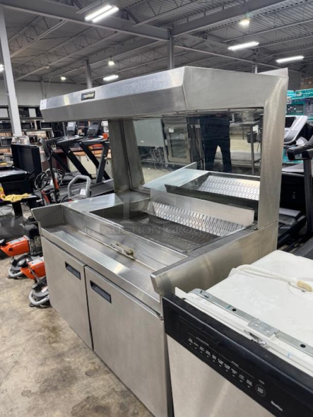 Delfield Money Maker fry dump station, 42", stainless steel, good condition, 120V, tested, with warming area and storage.