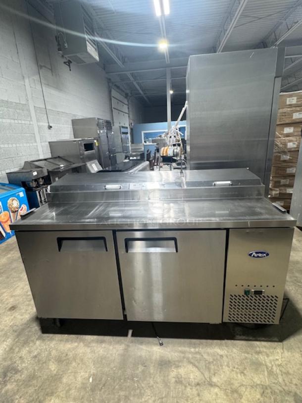 ATOSA MPF8202GR 2-door pizza prep table in excellent condition, stainless steel finish, tested and working.