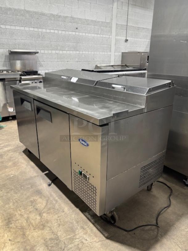 ATOSA MPF8202GR 2-door pizza prep table in like-new condition, stainless steel, tested and working.