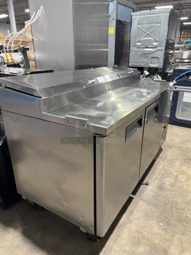 ATOSA MPF8202GR 2-door pizza prep table, stainless steel, looks new, tested and working. Features large prep surface.