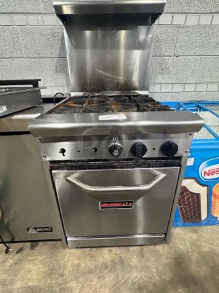 Tri-Star TSR-4 24" commercial gas range with 4 burners, chrome rack, and storage base. Tested, 33,000 BTUs per burner.