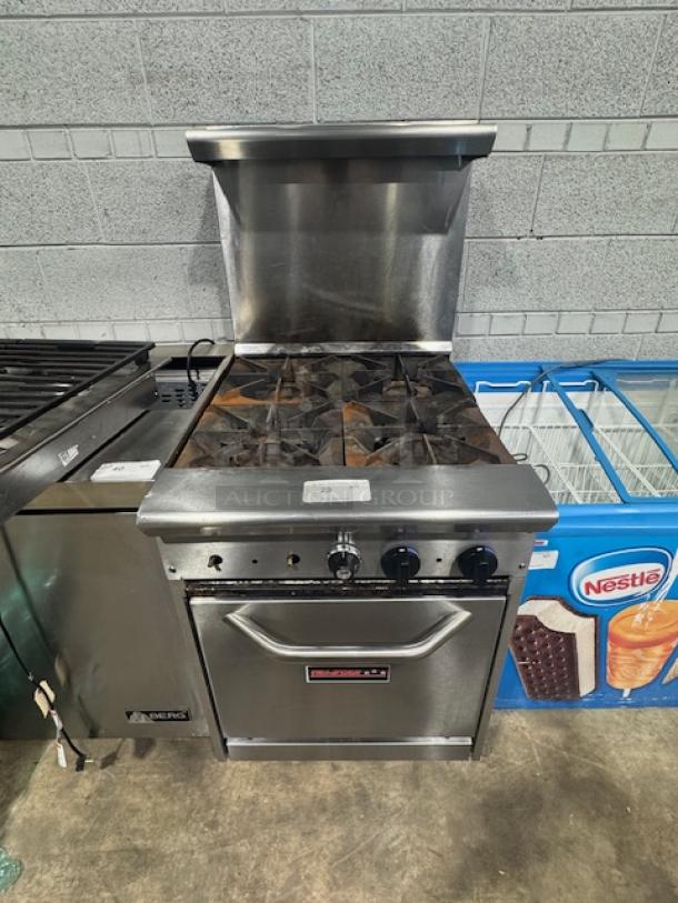 Tri-Star TSR-4 24" commercial gas range with 4 heavy-duty burners, storage base, and chrome rack. Tested, working, 33,000 BTUs per burner.