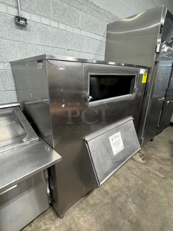 MGR SP-1650-SS ice storage bin, stainless steel, front opening, minor scratches, visible label and safety tag.