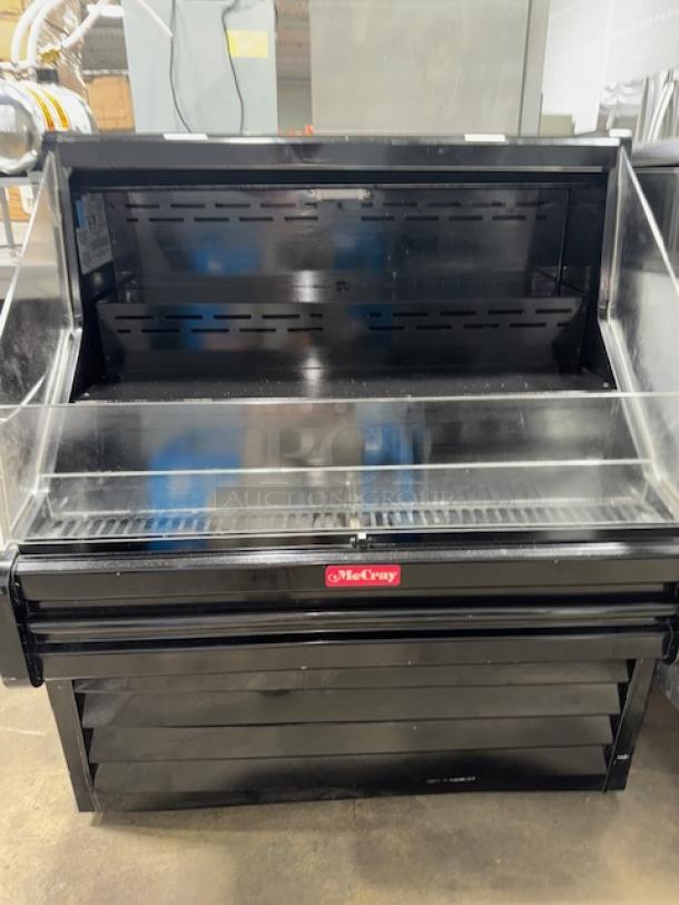 Howard-McCray 39" open air cooler, model SC-OS30E-3-B, with 3 levels. Black finish, good condition, clear front panel.