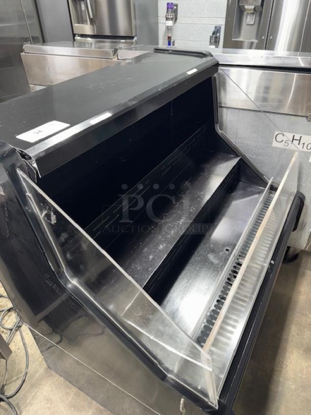 Howard-McCray 39" horizontal open air cooler, model SC-OS30E-3-B, features 3 levels, black finish, good condition, 115v.