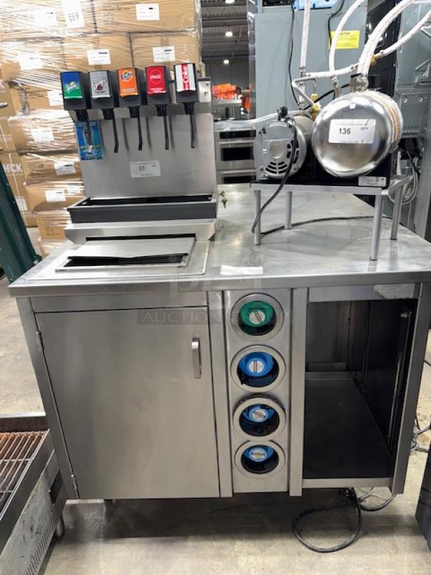 Stainless steel corner table by S&G Manufacturing, model BC7-1543, with dispenser setup, no drop-in dispenser included.