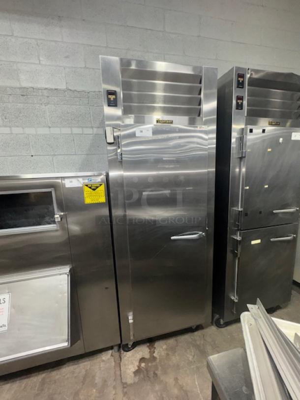 Traulsen RHT132WUT-FHS stainless steel refrigerator, 24.2 cu. ft., like new condition, specification line, tested and working.