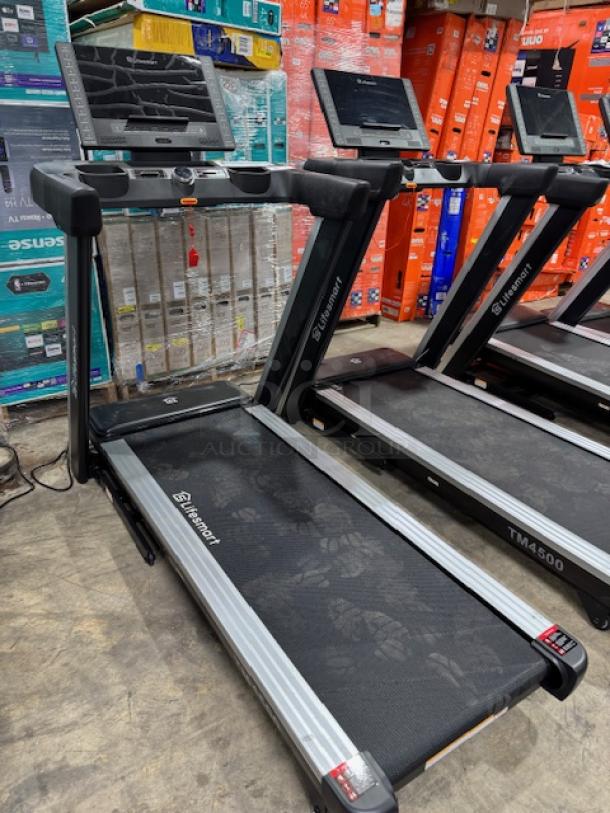 Lifesmart TM4500 PowerTouch™ Treadmill in good condition, features large touchscreen display, tested and working.