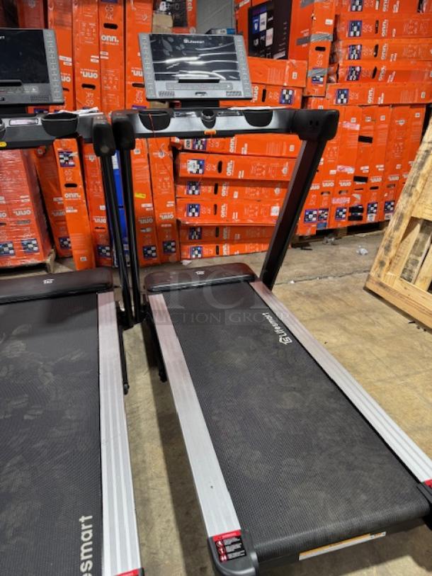 LIFESMART TM4500 Power Touch™ treadmill in good condition. Features include digital display and sturdy frame.