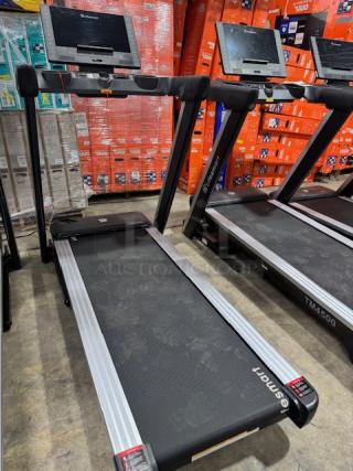 Lifesmart TM4500 PowerTouch™ treadmill, black, with digital screen and controls. Model label visible. Mint condition.