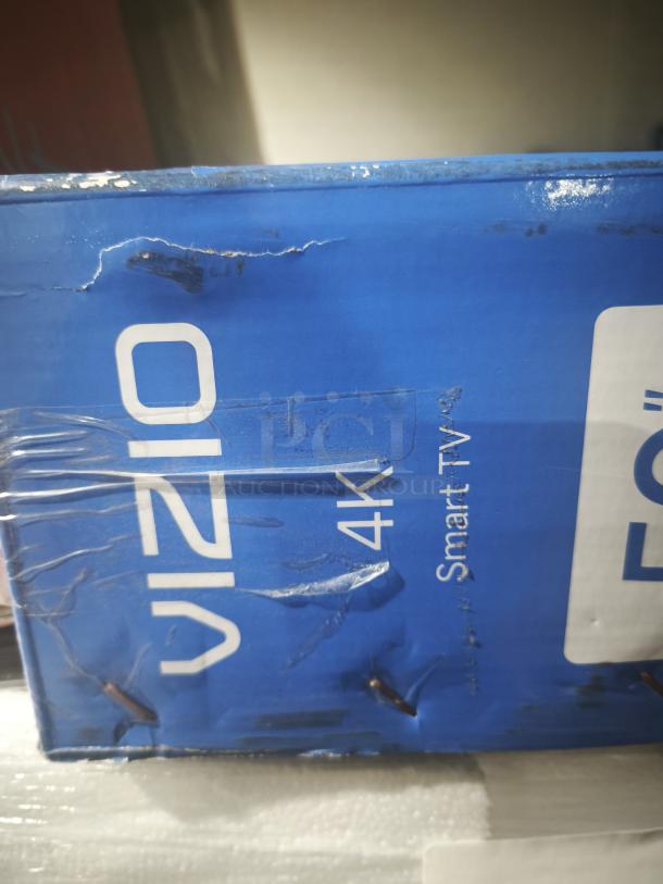 VIZIO V4K50C-0809 50" 4K UHD LED Smart TV in box, visible wear on packaging.