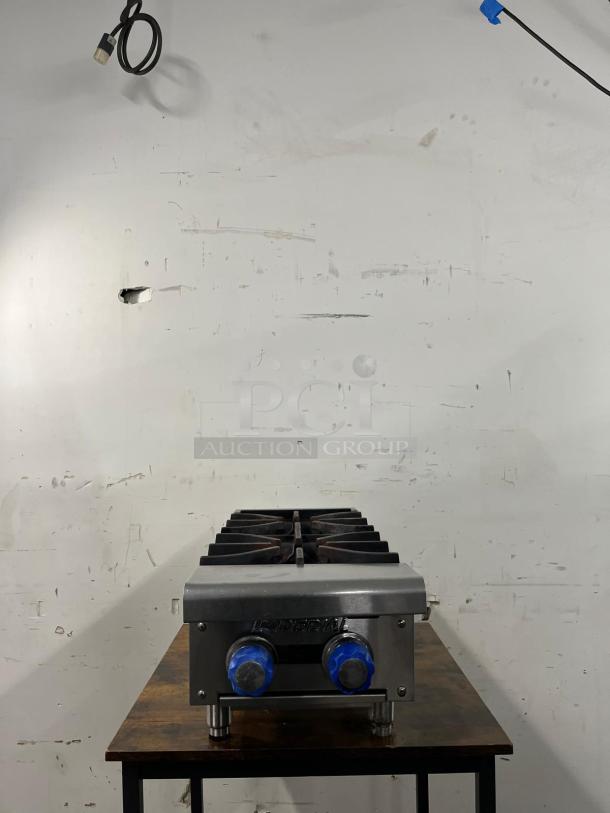 Imperial IHPA-2-12 gas hotplate featuring two 32,000 BTU/hr cast iron burners with PyroCentric technology.