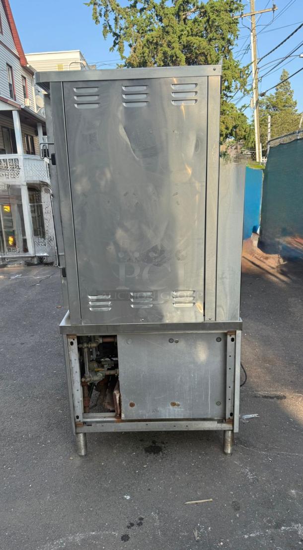 Market Forge ST-24M36G 24-Pan Convection Steamer, 300,000 BTU, freestanding, ST-24 Series, stainless steel, good condition.