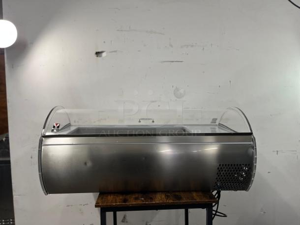 Tecfrigo Microgel 2 countertop ice cream display case, stainless steel, curved glass, excellent condition, shown on table.